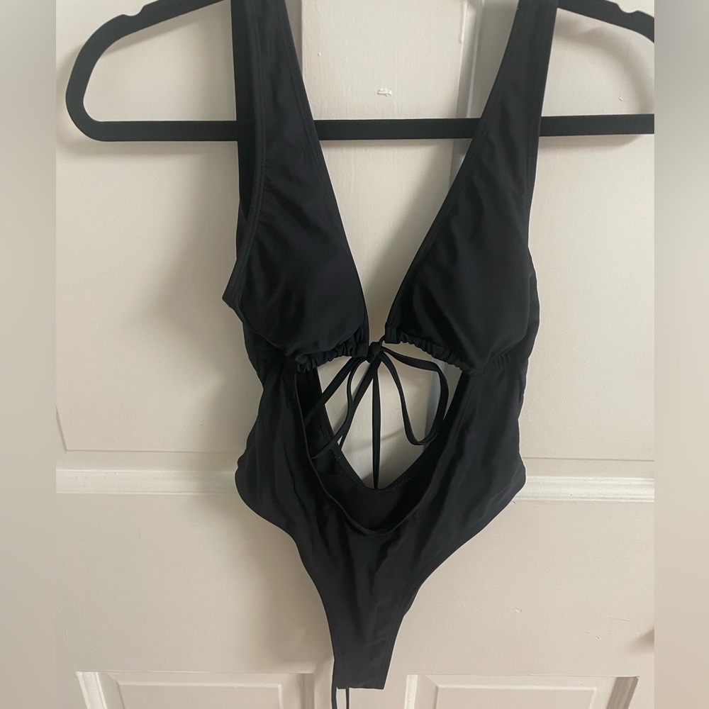 Black one piece swimsuit cutout size small